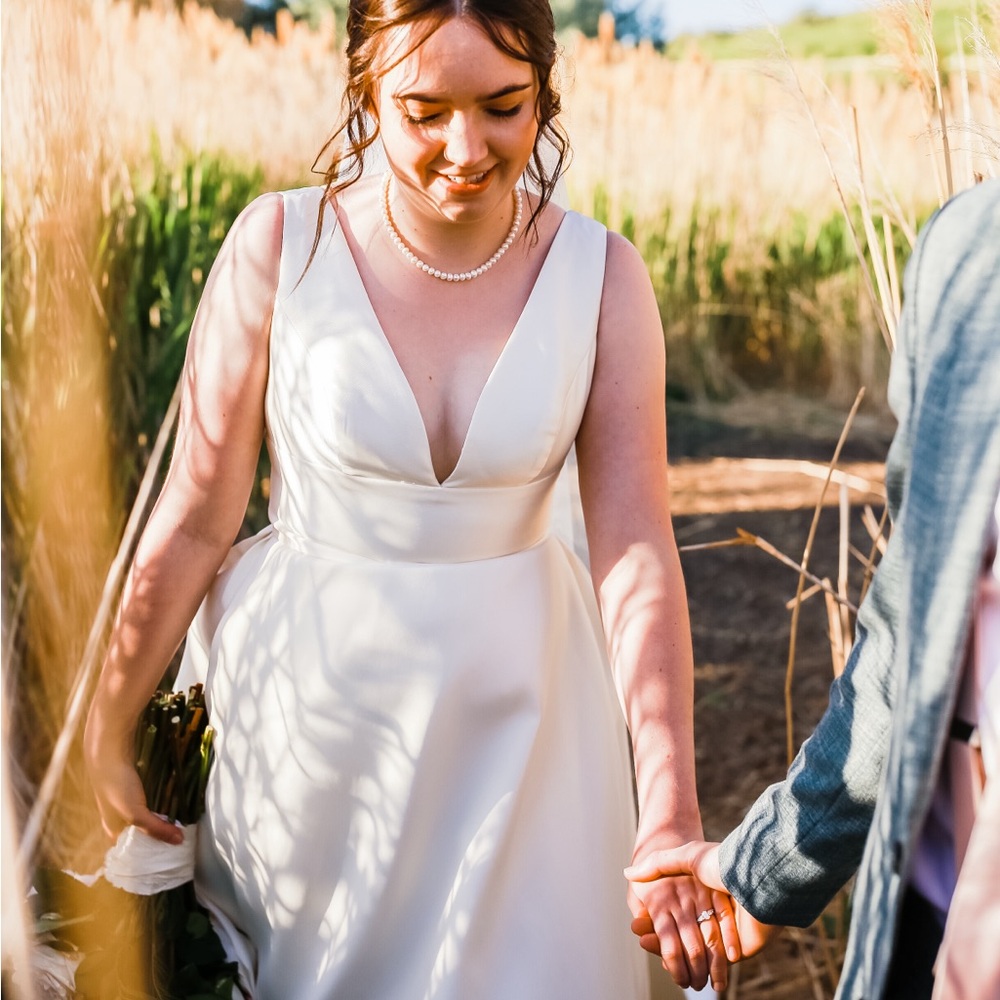 Wedding dress! Size 8, ivory with buttons down the back.